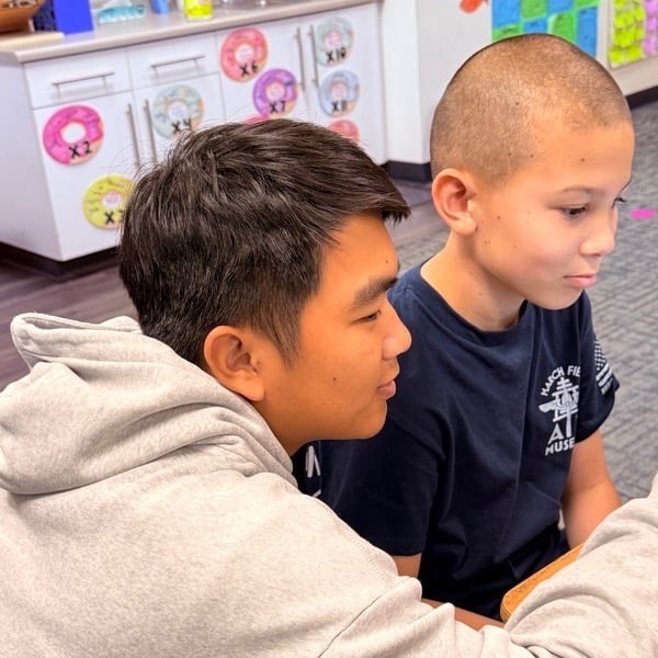Teacher with student