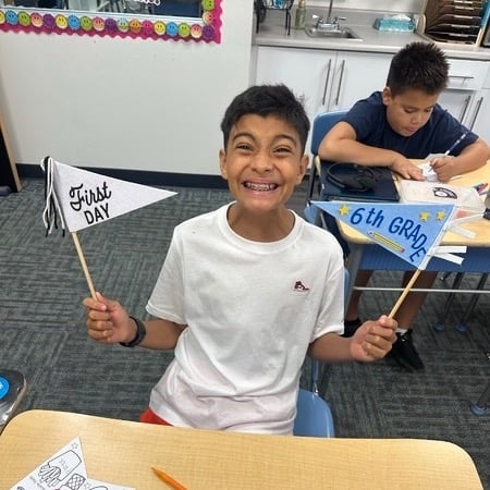 Boy excited for first day of school
