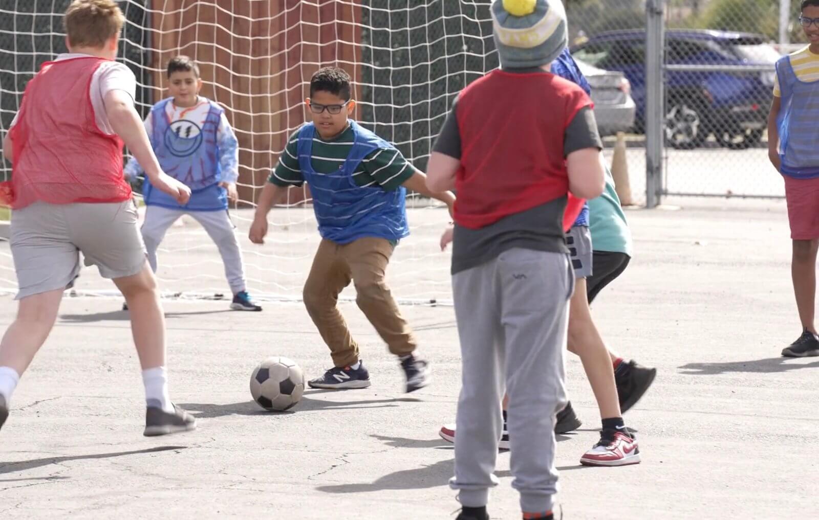 Playing soccer outside