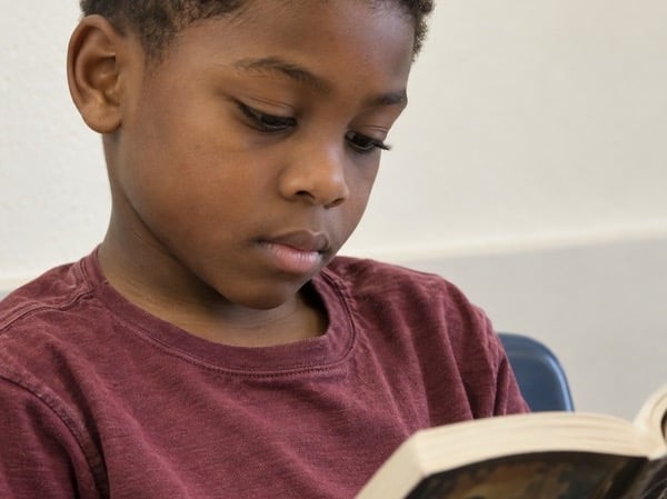 Student reading book at TCC