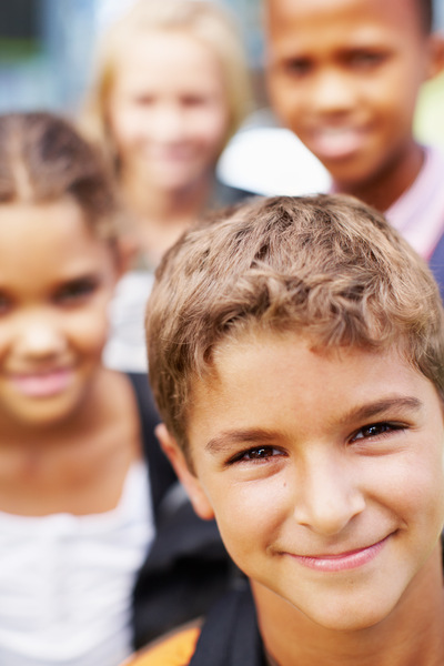 students smiling at the camera