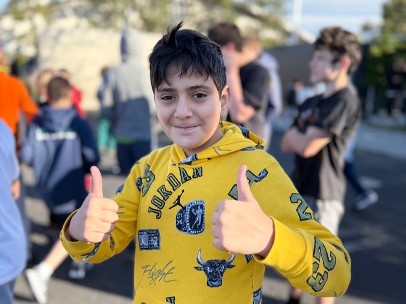 Thumbs up during recess with friends