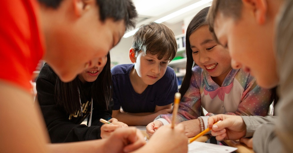 Students learning in a small-group classroom at a specialized school for ADHD and ASD in Orange County, California