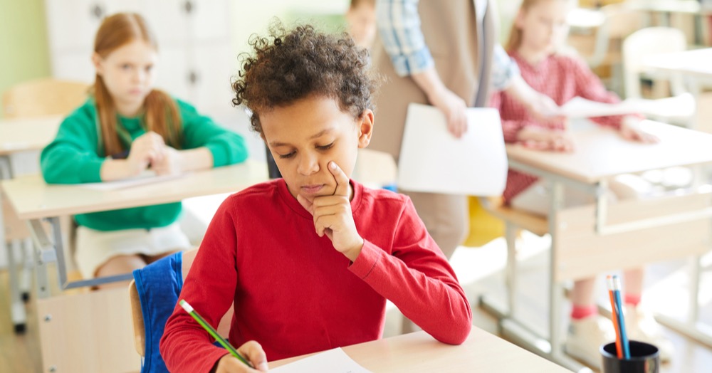 Student with ADHD working in classroom