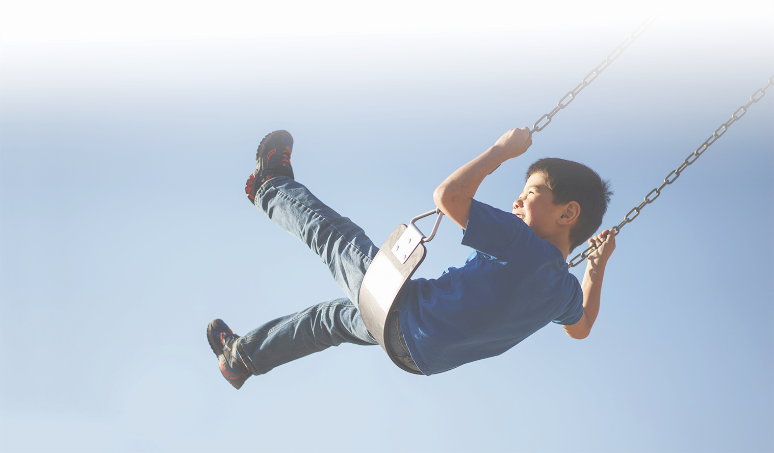 boy on a swing banner mobile